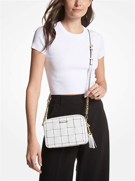 michael kors ginny medium|Ginny Medium Woven Leather Crossbody Bag .